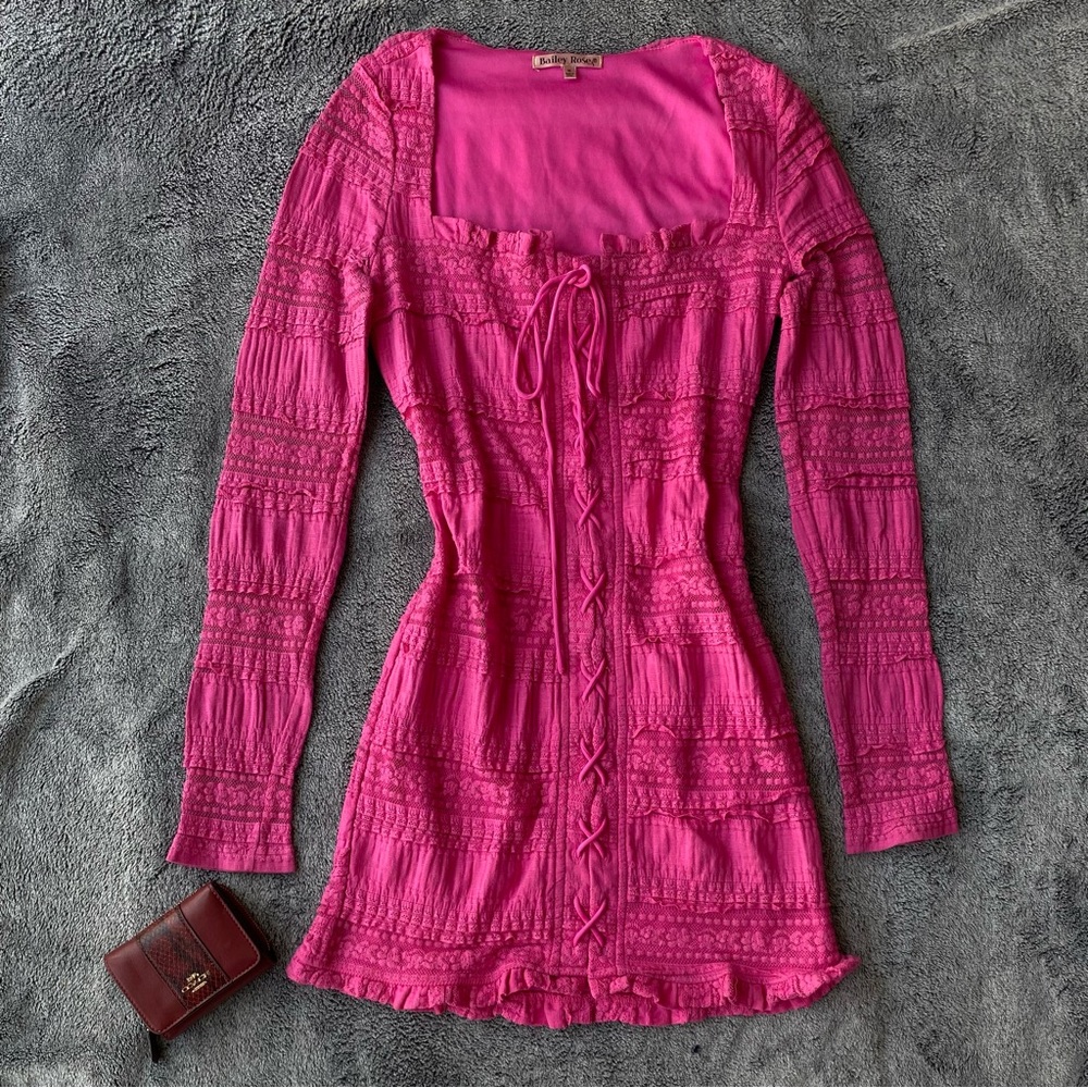 Cutest coquette Pink long sleeve mini dress with lace up detail and ruffles